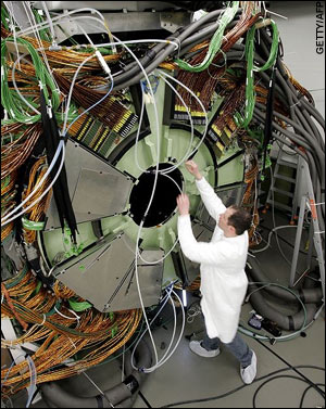 A scientist works at the Cern's Large Hadron Collider